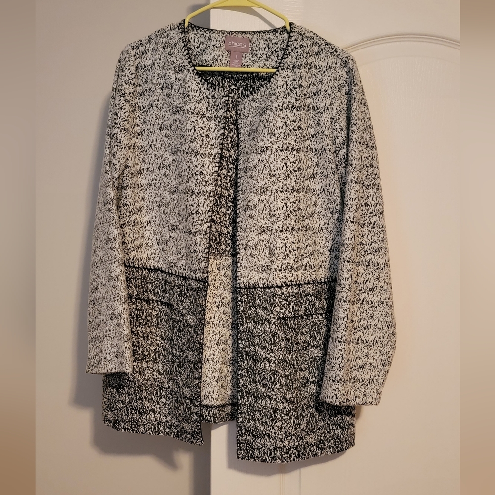 Chicos, size 1, black and white jacket, detailing on neck.